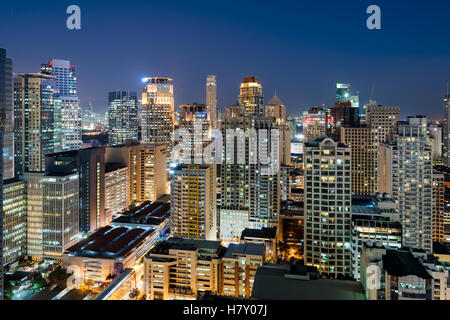 Makati Skyline at night. Makati is a city in the Philippines` Metro Manila region and the country`s financial hub. Stock Photo